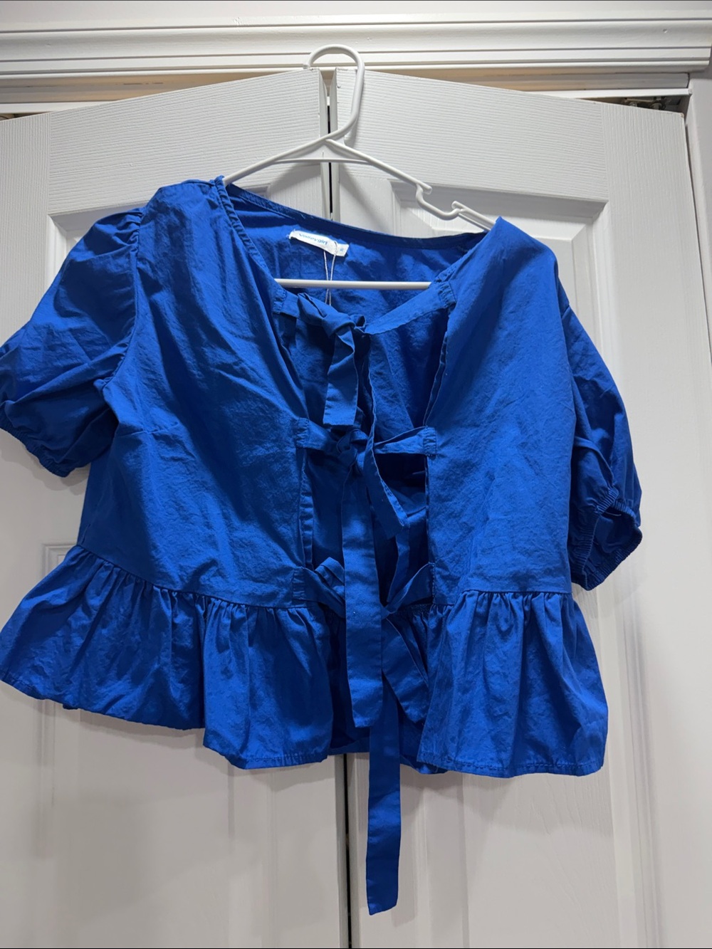 Tie-Front Peplum Blouse in Vibrant Blue